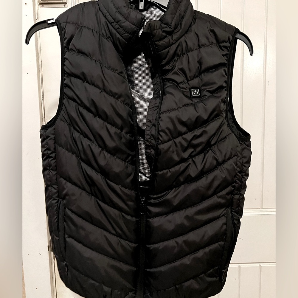 Black vest with power cords heated vest